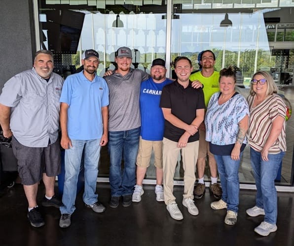 C&M Restoration office staff at Top Golf in 2024
